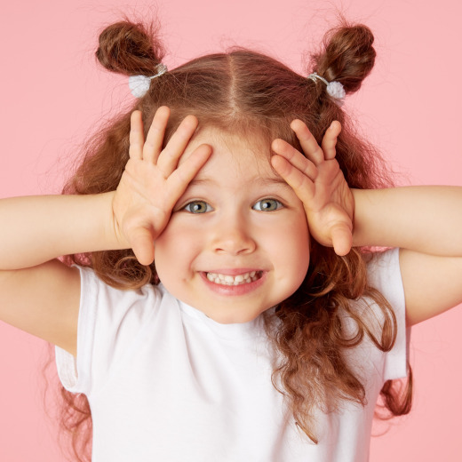 Happy child smiling and engaging in ABA therapy in Chattanooga, fostering social skills, communication, and emotional development in a supportive and fun environment.